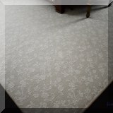 D05. Floral pattern rug in shades of white and cream. 11' x 16' - $425